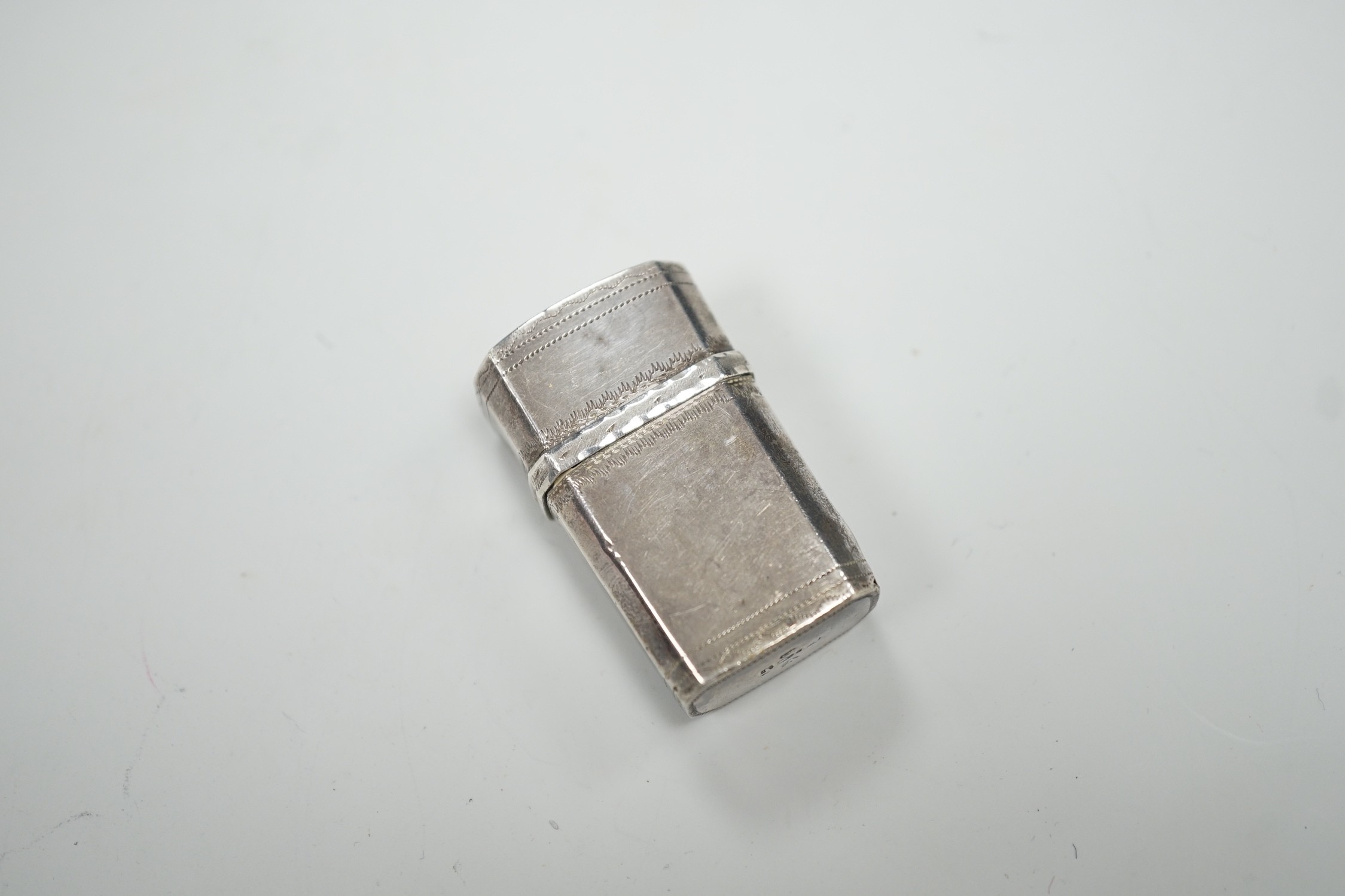A George IV engraved silver fleam case?, by Thomas Wilmore?, Birmingham, 1822, 36mm.